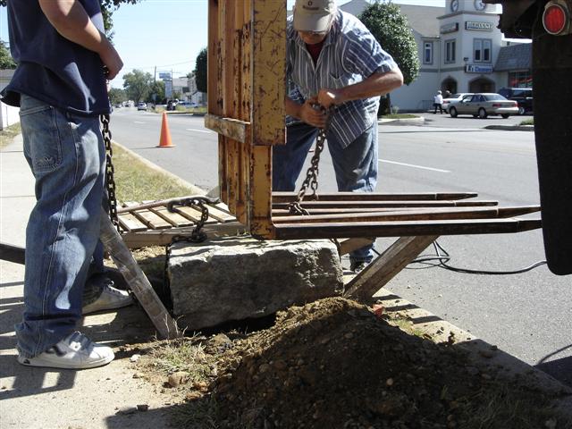 Lowering the stone into place October 1, 2005.